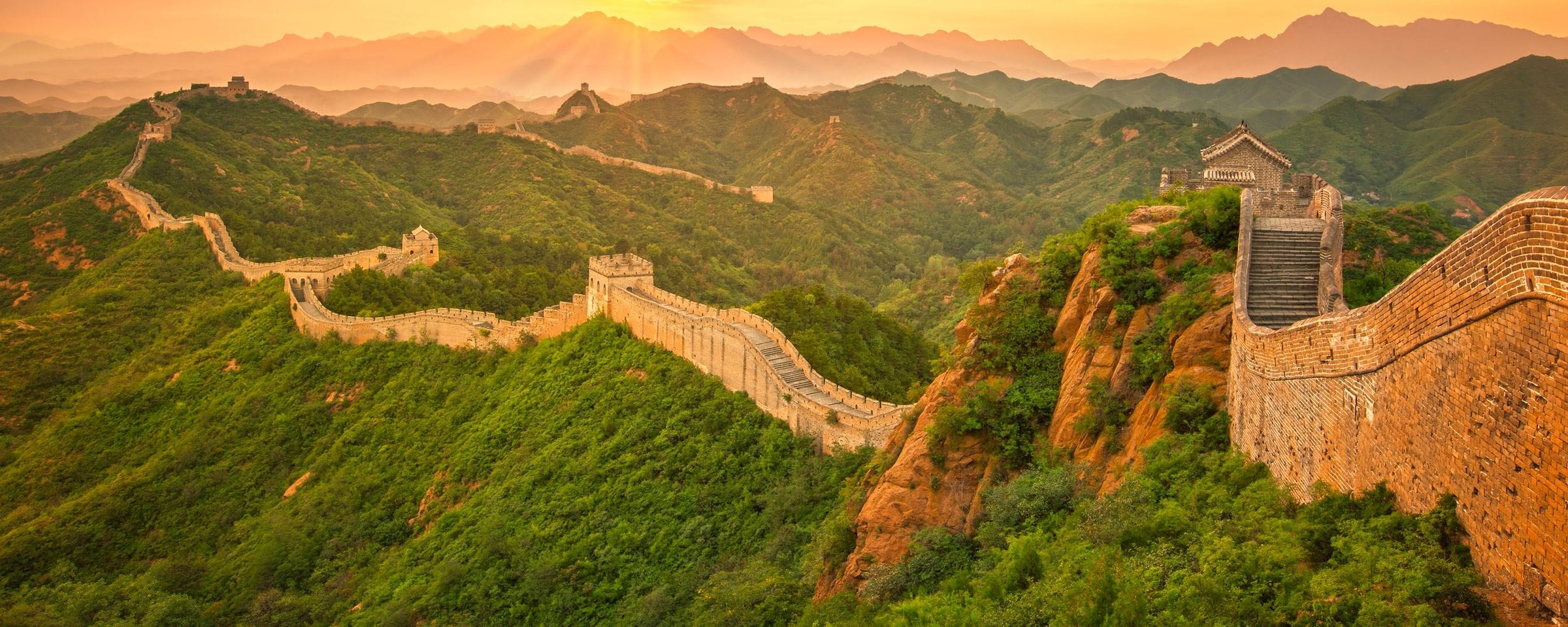 Muraille de Chine au soleil couchant