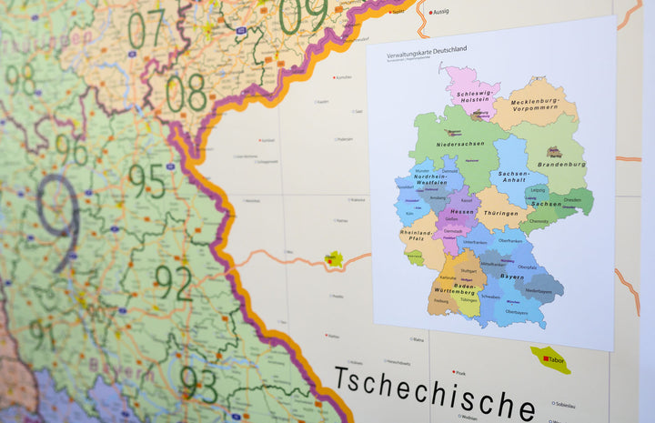 Laminated wall map (in German) - Germany, with postal codes (100 x 140 cm) + metal strips | GeoMetro